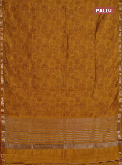 Semi raw silk saree mustard yellow with allover geometric prints and zari woven border