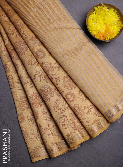 Semi raw silk saree sandal with allover geometric prints and zari woven border