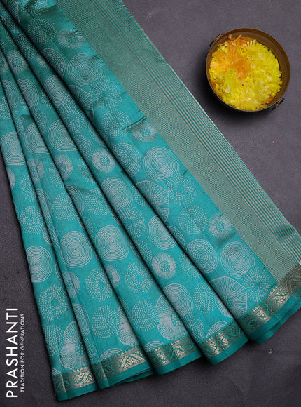 Semi raw silk saree teal blue with allover geometric prints and zari woven border