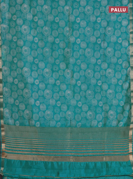 Semi raw silk saree teal blue with allover geometric prints and zari woven border
