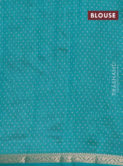 Semi raw silk saree teal blue with allover geometric prints and zari woven border