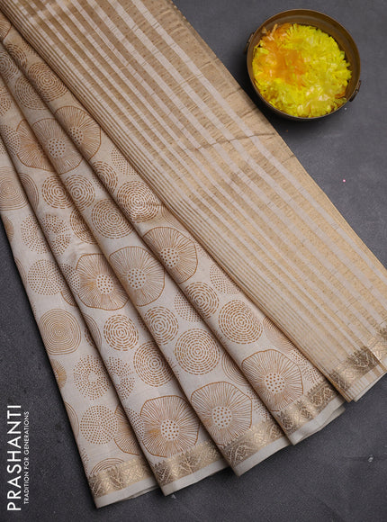 Semi raw silk saree cream with allover geometric prints and zari woven border