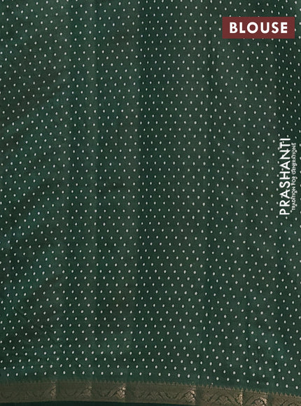 Semi raw silk saree bottle green with allover geometric prints and zari woven border