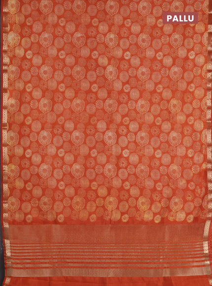 Semi raw silk saree rust shade with allover geometric prints and zari woven border