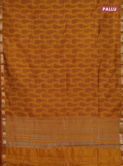 Semi raw silk saree mustard yellow with allover paisley prints and zari woven border