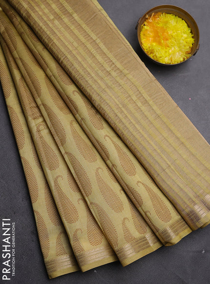 Semi raw silk saree mustard shade with allover paisley prints and zari woven border