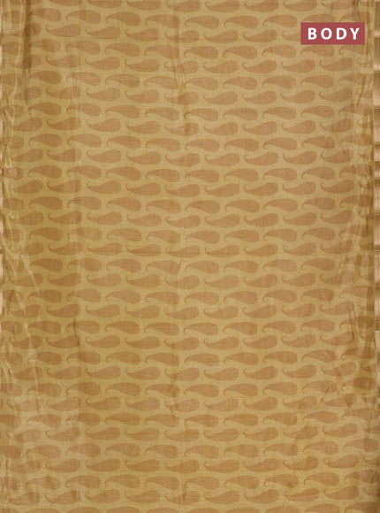 Semi raw silk saree mustard shade with allover paisley prints and zari woven border