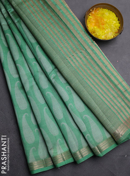 Semi raw silk saree green with allover paisley prints and zari woven border