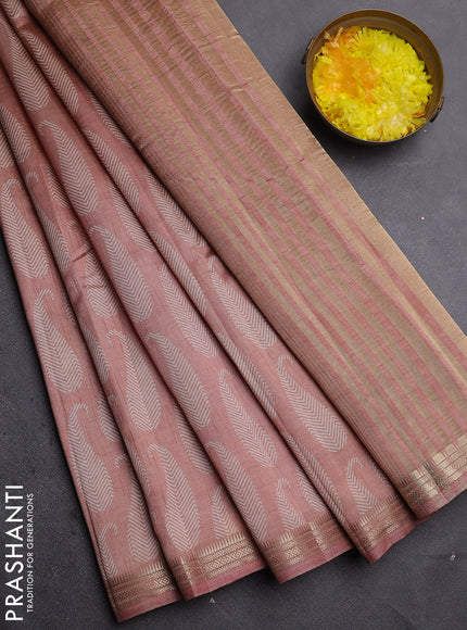 Semi raw silk saree pastel peach with allover paisley prints and zari woven border