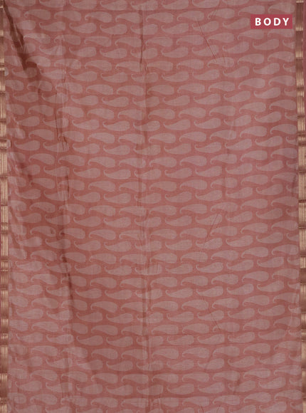 Semi raw silk saree pastel peach with allover paisley prints and zari woven border