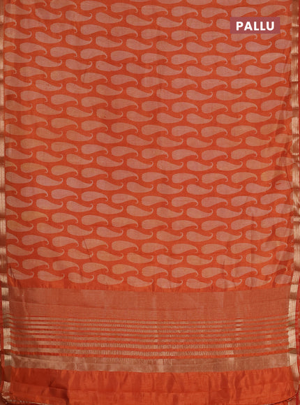 Semi raw silk saree rust shade with allover paisley prints and zari woven border