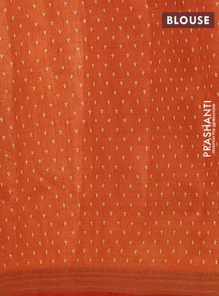 Semi raw silk saree rust shade with allover paisley prints and zari woven border