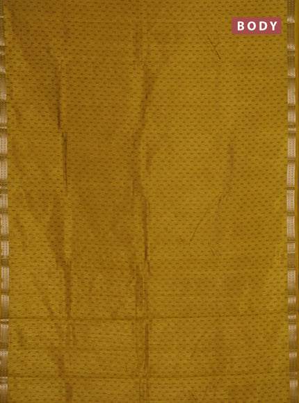 Semi raw silk saree mustard yellow with allover butta prints and zari woven border