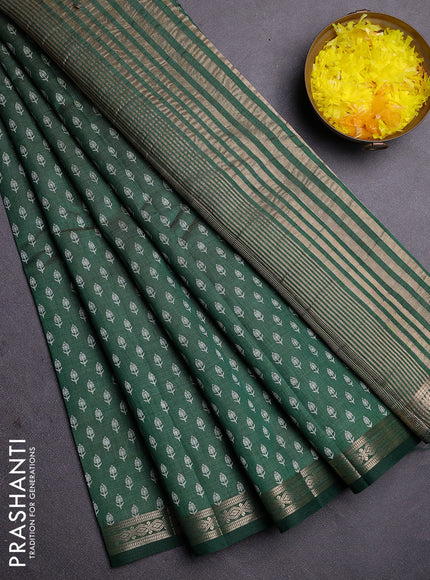 Semi raw silk saree bottle green with allover butta prints and zari woven border