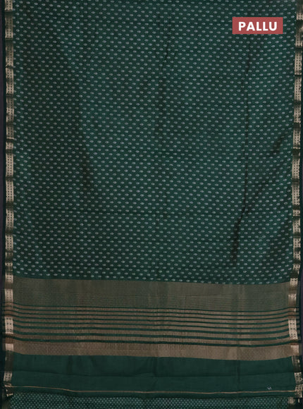 Semi raw silk saree bottle green with allover butta prints and zari woven border