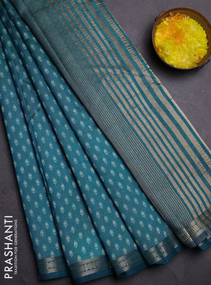 Semi raw silk saree cs blue with allover butta prints and zari woven border