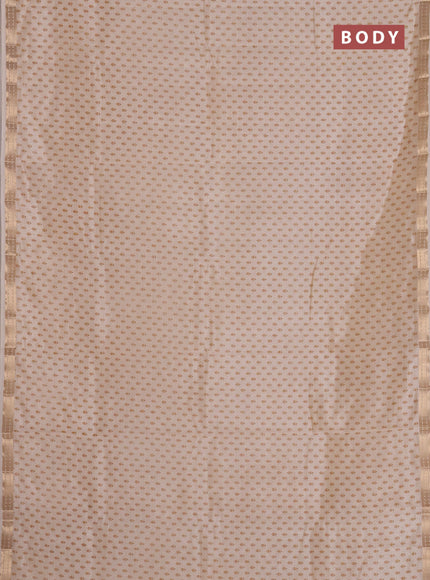 Semi raw silk saree cream with allover butta prints and zari woven border