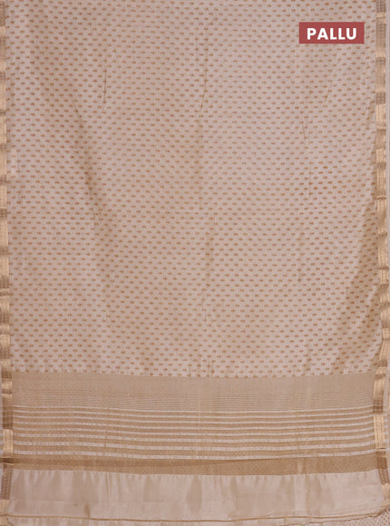Semi raw silk saree cream with allover butta prints and zari woven border
