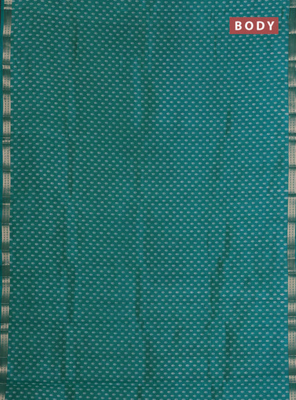 Semi raw silk saree teal blue with allover butta prints and zari woven border