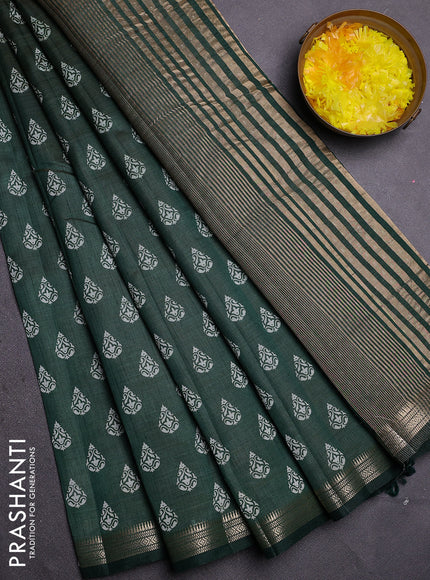 Semi raw silk saree bottle green with allover butta prints and zari woven border