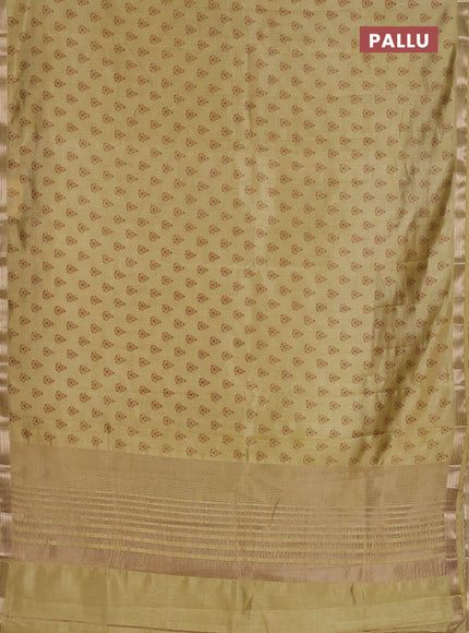 Semi raw silk saree mustard shade with allover butta prints and zari woven border