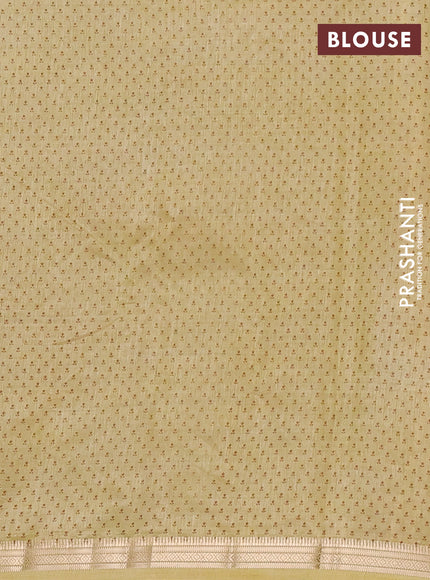 Semi raw silk saree mustard shade with allover butta prints and zari woven border