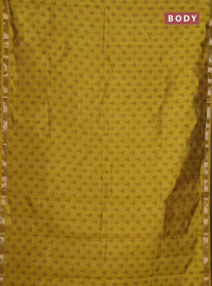 Semi raw silk saree lime yellow with allover butta prints and zari woven border