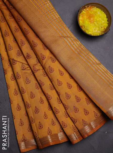 Semi raw silk saree mustard yellow with allover butta prints and zari woven border