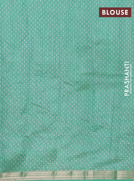 Semi raw silk saree green with allover butta prints and zari woven border