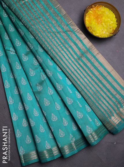 Semi raw silk saree teal blue with allover butta prints and zari woven border