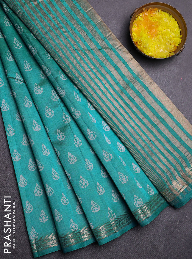 Semi raw silk saree teal blue with allover butta prints and zari woven border