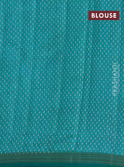 Semi raw silk saree teal blue with allover butta prints and zari woven border