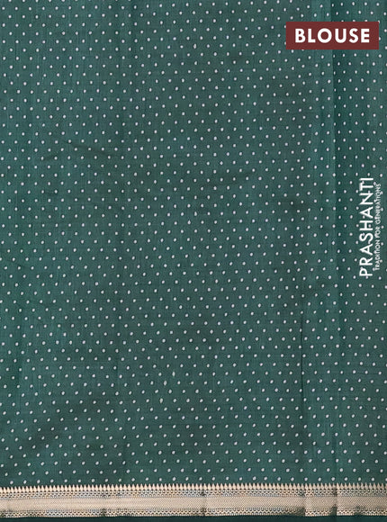 Semi raw silk saree bottle green with allover geometric prints and zari woven border