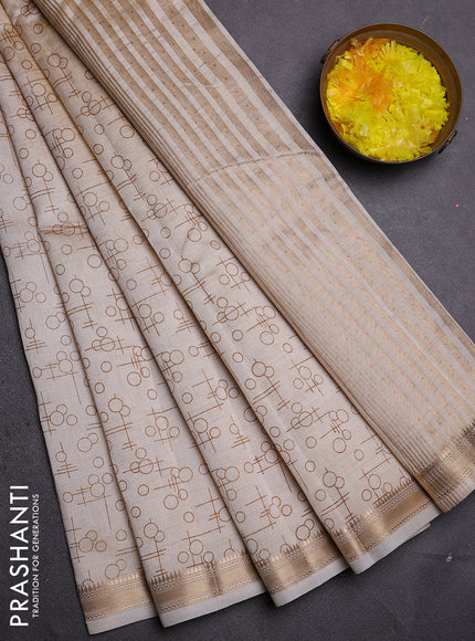 Semi raw silk saree cream with allover geometric prints and zari woven border