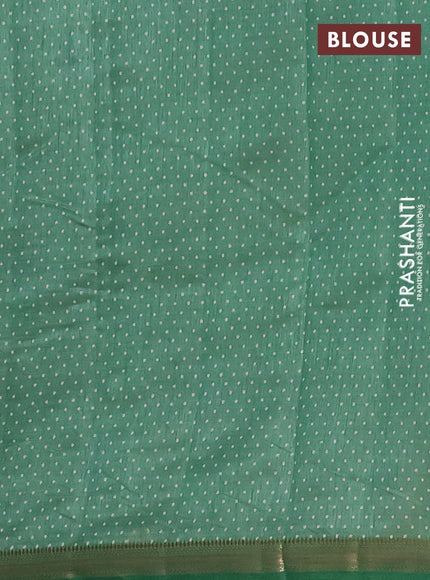 Semi raw silk saree green shade with allover geometric prints and zari woven border