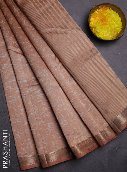 Semi raw silk saree pastel peach with allover geometric prints and zari woven border