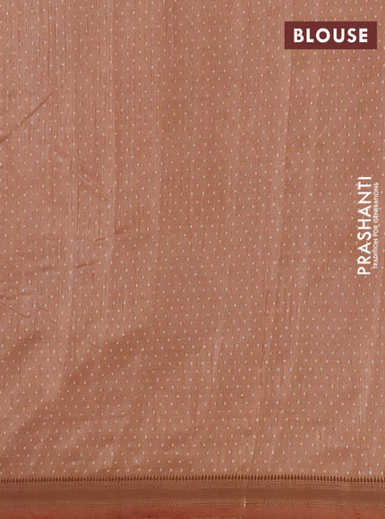 Semi raw silk saree pastel peach with allover geometric prints and zari woven border