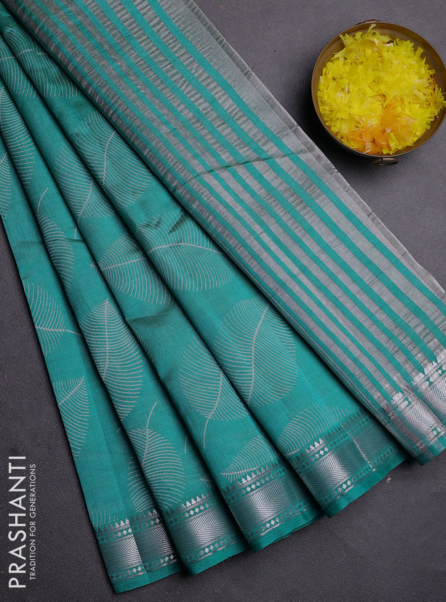 Semi raw silk saree teal blue with allover leaf butta prints and zari woven border