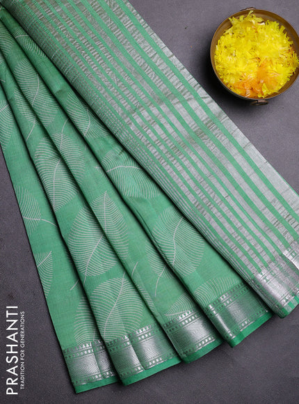 Semi raw silk saree green shade with allover leaf butta prints and zari woven border