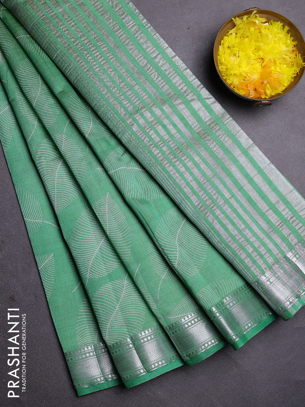 Semi raw silk saree green shade with allover leaf butta prints and zari woven border
