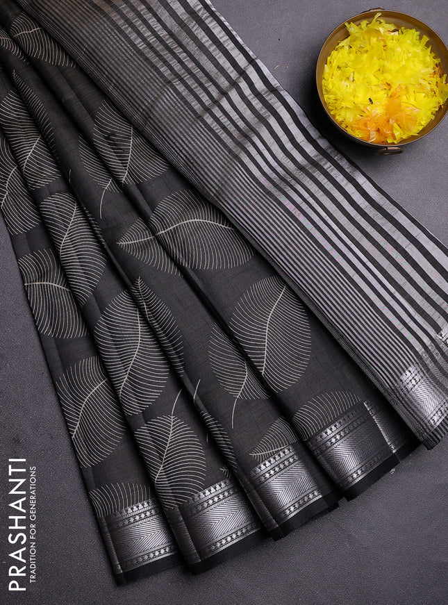 Semi raw silk saree black with allover leaf butta prints and zari woven border