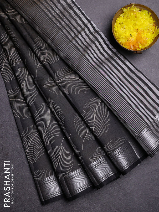 Semi raw silk saree black with allover leaf butta prints and zari woven border