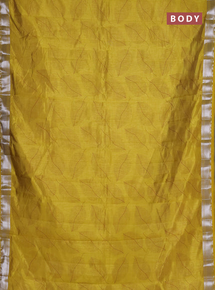 Semi raw silk saree mustard yellow with allover leaf butta prints and zari woven border