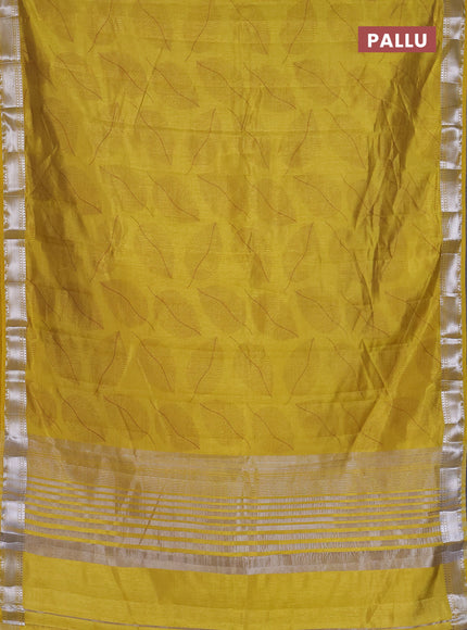 Semi raw silk saree mustard yellow with allover leaf butta prints and zari woven border