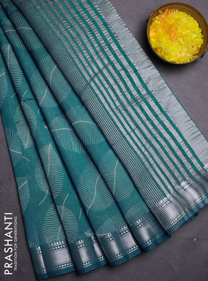 Semi raw silk saree cs blue with allover leaf butta prints and zari woven border