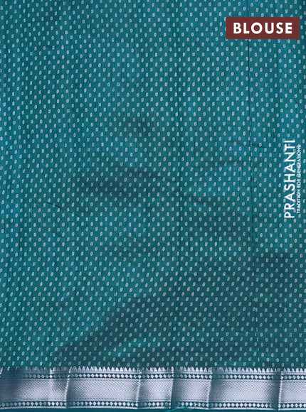 Semi raw silk saree cs blue with allover leaf butta prints and zari woven border