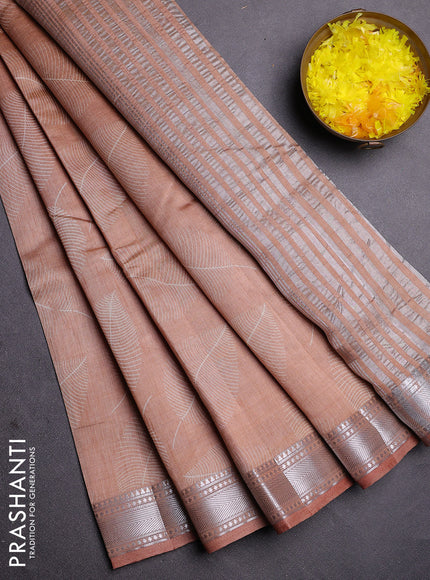 Semi raw silk saree pastel peach with allover leaf butta prints and zari woven border