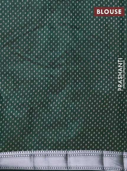 Semi raw silk saree bottle green with allover leaf butta prints and zari woven border