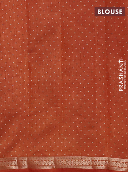 Semi raw silk saree rust shade with allover geometric prints and zari woven border