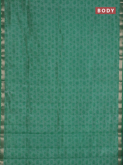 Semi raw silk saree green shade with allover geometric prints and zari woven border